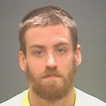 Charged with threatening the assassination of President Trump.